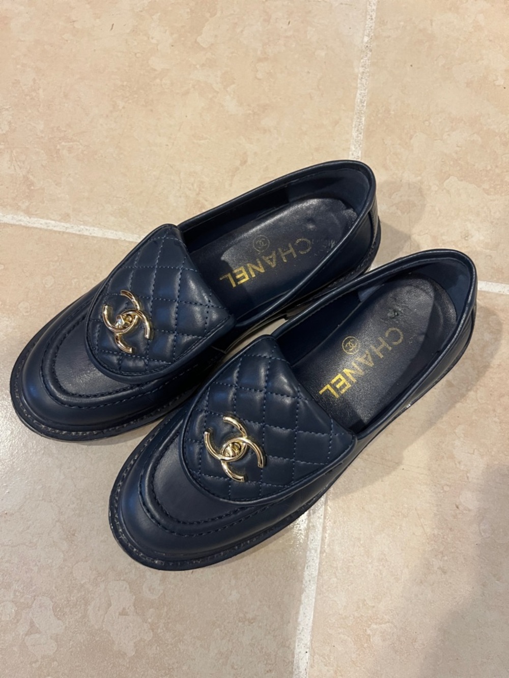 CHANEL Quilted Navy  Loafers with Gold CC Hardware
